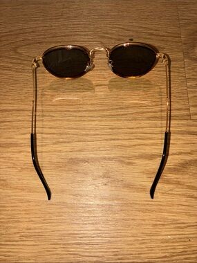 Oval Tortoiseshell Sunglasses with Gold Metal Arms